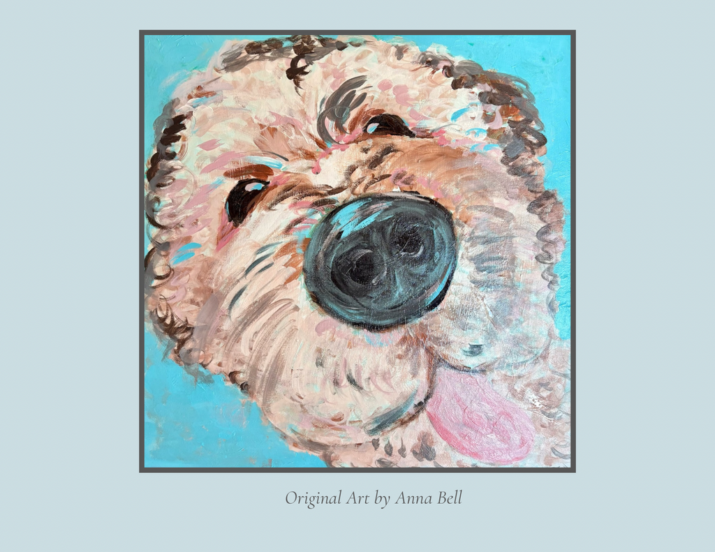 A square art print featuring a stylized painted portrait of a dog's face on a light blue background, with the text 'Original Art by Anna Bell' below the artwork.