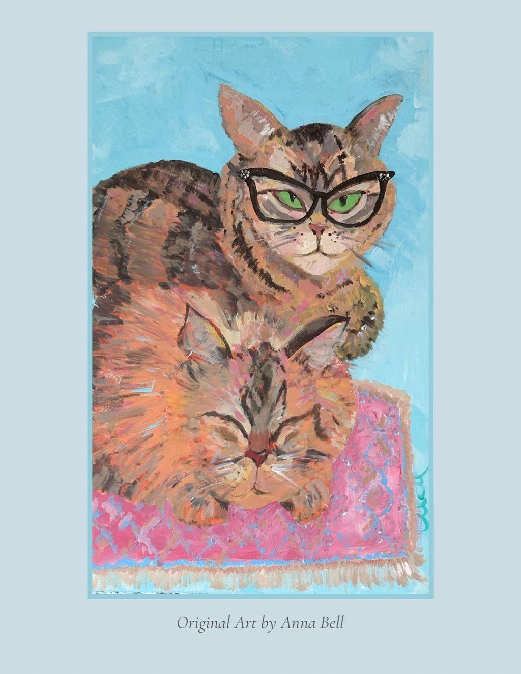 A square art print featuring a painted tabby cat wearing black-rimmed glasses and resting on a pink patterned rug against a light blue background. The print includes the text 'Original Art by Anna Bell' along the right edge and is shown centered on a pale blue backdrop.