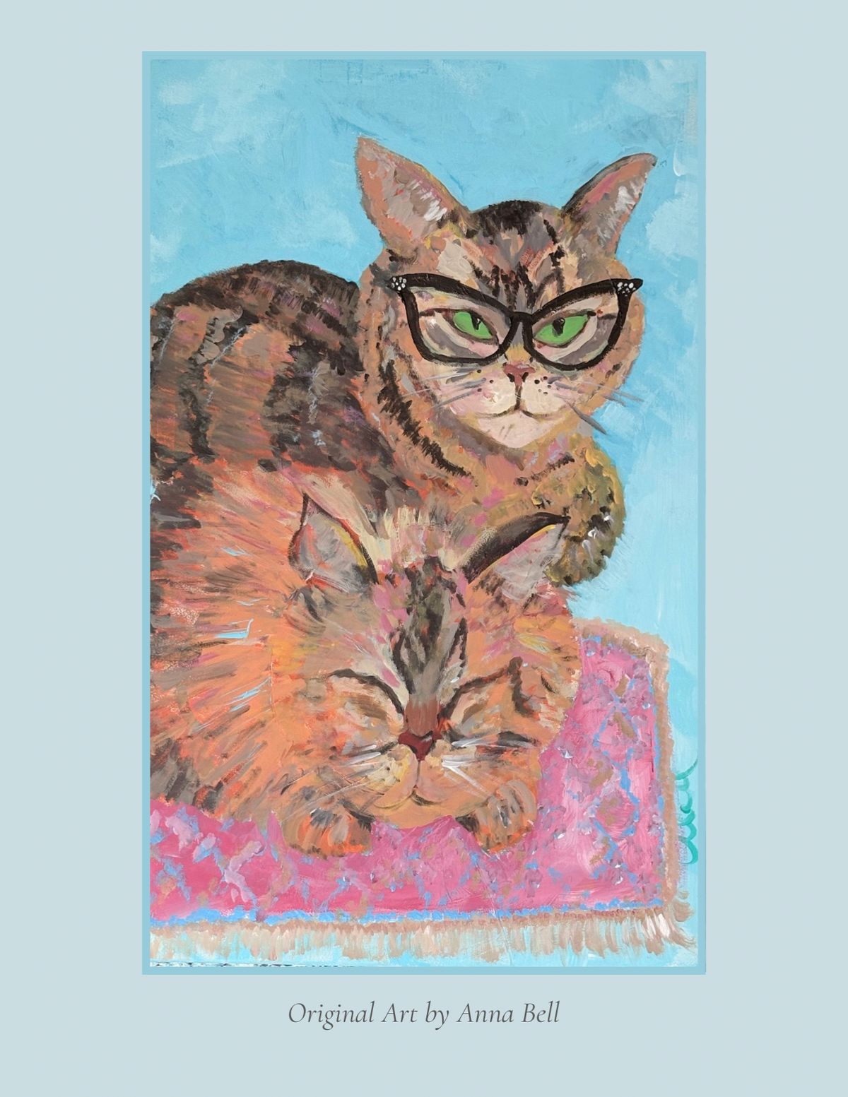 A square art print featuring a painted tabby cat wearing black-rimmed glasses and resting on a pink patterned rug against a light blue background. The print includes the text 'Original Art by Anna Bell' along the right edge and is shown centered on a pale blue backdrop.